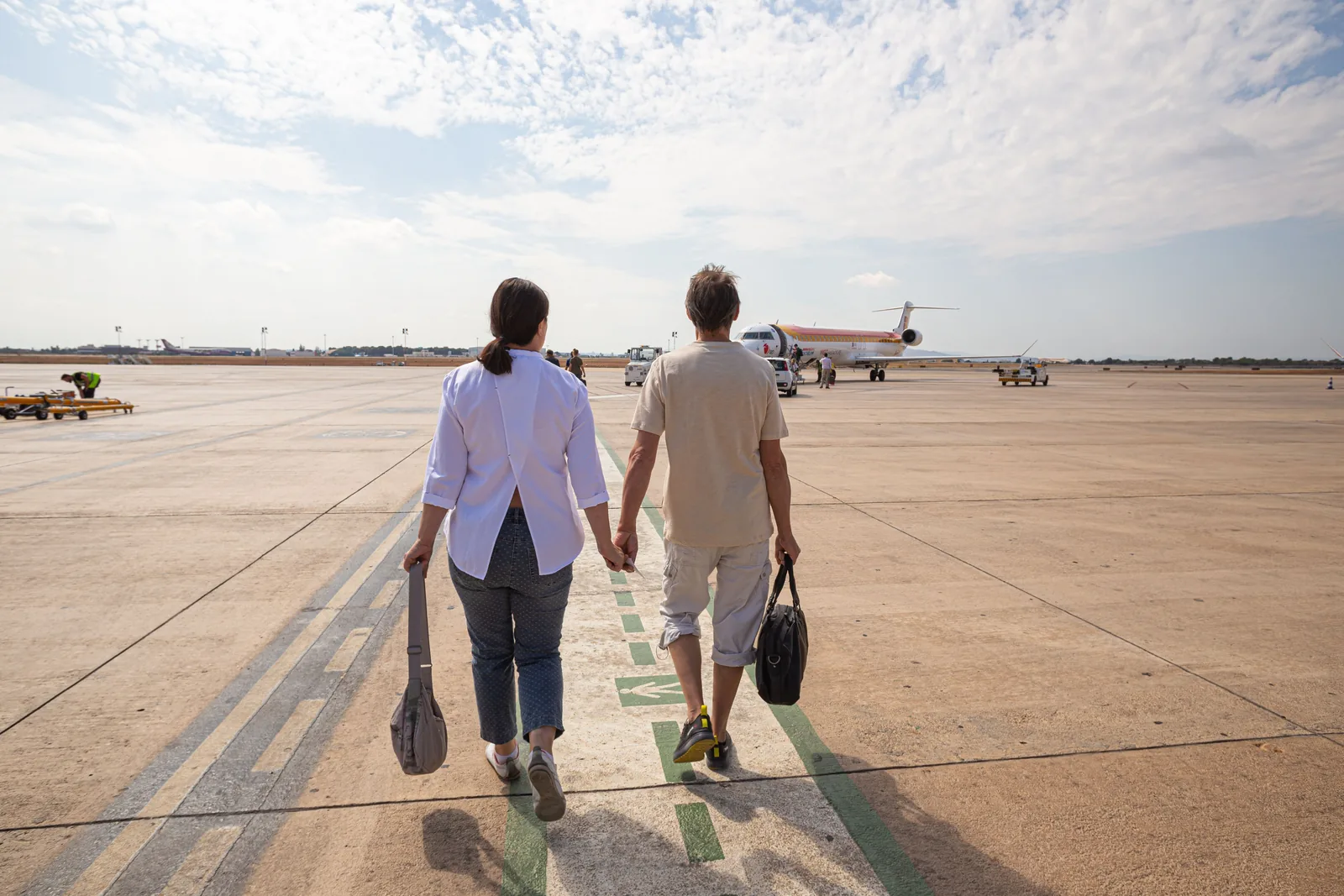 International couple travelling by air for medical treatment